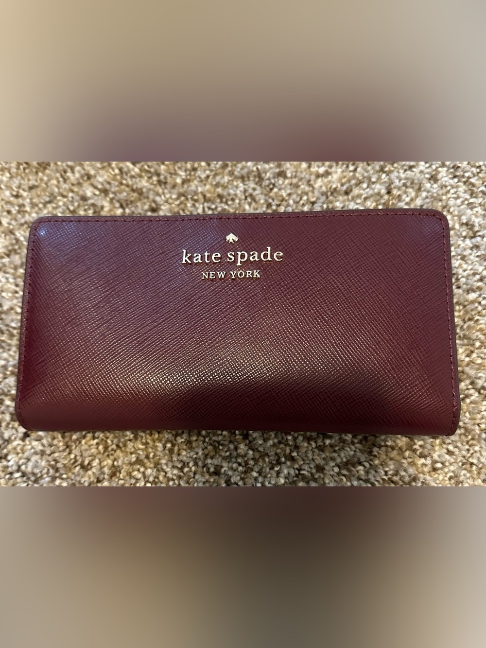 Kate Spade Burgundy Saffiano Leather Continental Wallet with Gold Logo